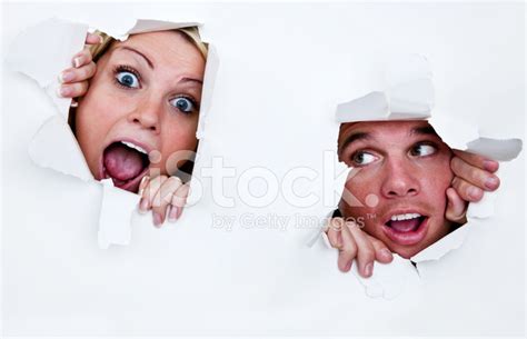 Man And Woman Breaking Through Wall Stock Photo Royalty Free Freeimages