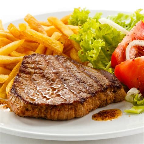 Beef Steak Served With Chips Salad