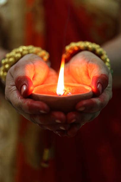 Diya Hand Stock Photos Pictures And Royalty Free Images Istock