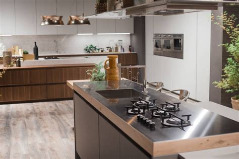 Even after the walls, windows, and cabinets have been updated, it seems daunting to decorate a space that seems so strictly functional. Kitchen Design Idea - Integrated Cooktop Counter