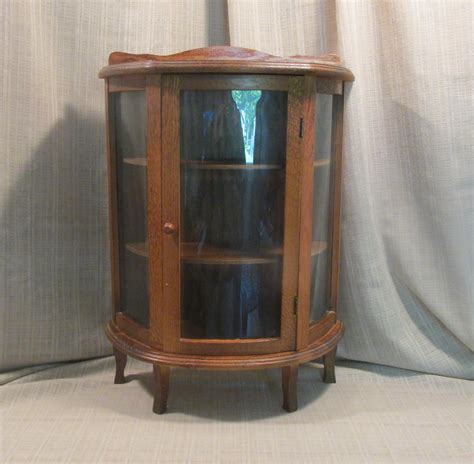 Lovely Small Curio Cabinet Rounded Circle Glass Front Solid Tiger