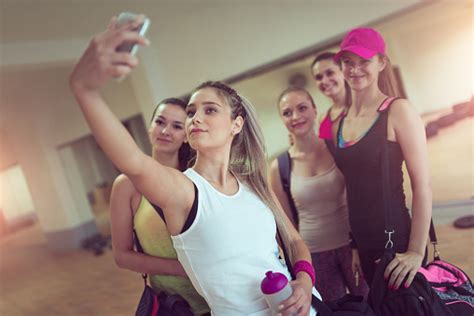 Happy Girlfriends Group Taking Selfie In Gym After Exercise Foto De Stock Y Más Banco De