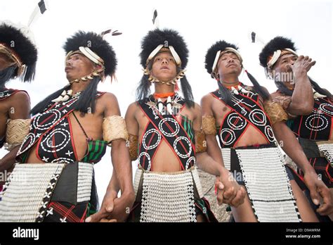 Naga Tribal Warriors In Traditional Outfit Performing In Hornbill