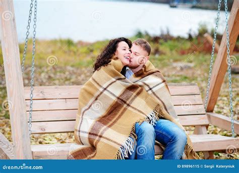 Amorous Couple On Romantic Date On Swings Outdoor Stock Image Image