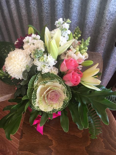 Romantic pastels and whites, floral arrangements for the one you love. Designed in Kununurra