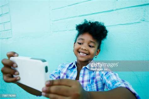 African American Girl Taking Selfie Photos And Premium High Res Pictures Getty Images
