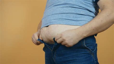 Fat Man Trying To Fasten Tight Jeans Stock Video Video Of Healthy
