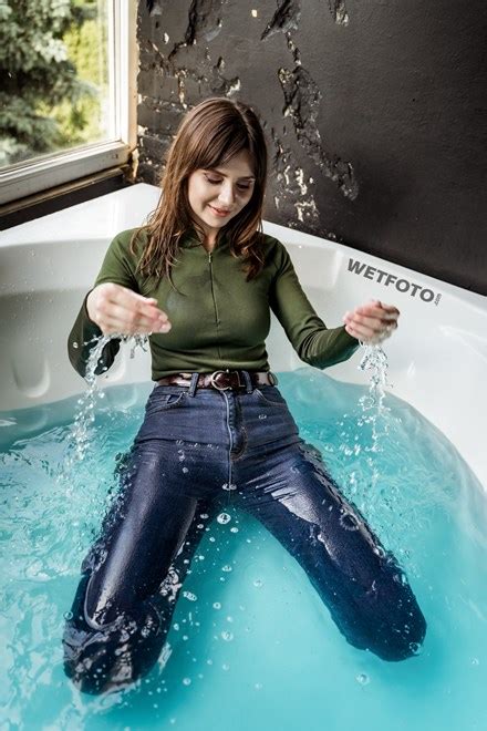 Hot Lady Takes A Bath In Blue Skinny Jeans And Gets Completely Wet Wetfoto Com