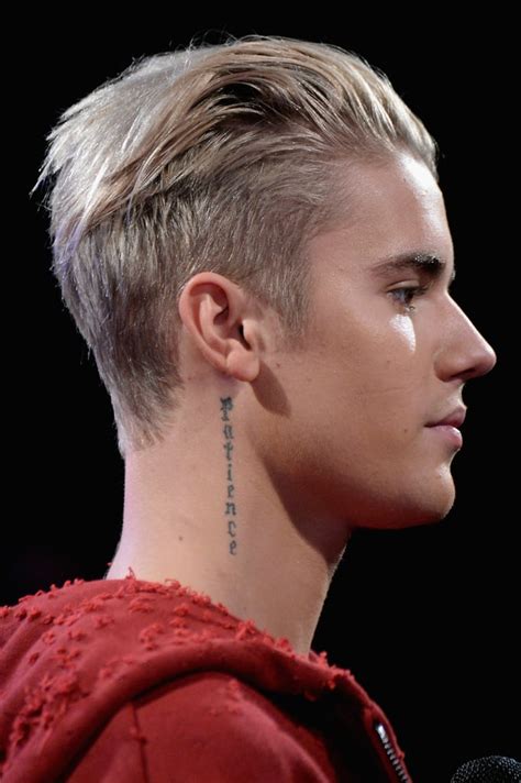 Justin Biebers Tattoos And Meanings Popsugar Beauty Uk