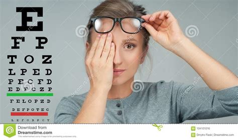 Woman In Glasses Eye Test Eyesight Vision Exam Chart Stock Photo