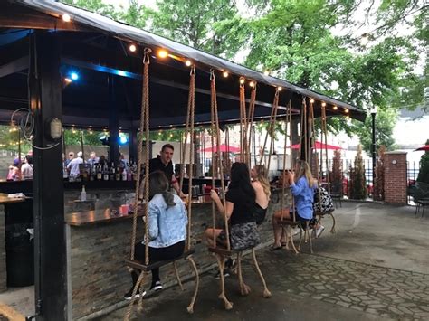 No Secret Knock Required Treehouse Patio Bar Offers Swing Seats Group
