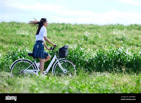 Japanese high school student on a bike outdoors Stock Photo - Alamy