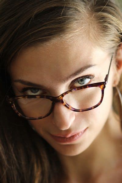 selective focus photo of eyeglasses hold by woman photo free human image on unsplash natural