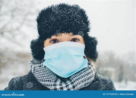 Young Woman Wear Face Mask For Sickness Coronavirus Protection