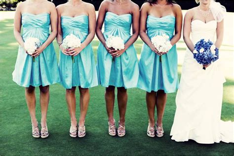 You can get the ideas from the carefully think about a color scheme that will match perfectly with your wedding theme. Aqua strapless bridesmaids dresses and white bridesmaid ...