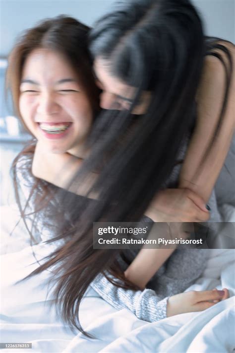Beautiful Young Asian Women Lgbt Lesbian Happy Couple Hugging And Smiling While Lying Together