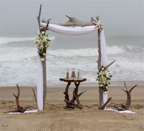Standard Driftwood Arch with added driftwood accents and florals! | Driftwood wedding, Driftwood ...