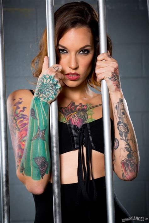 Caged Tattoo Slut Shows Her Petite Body And Xxx Dessert