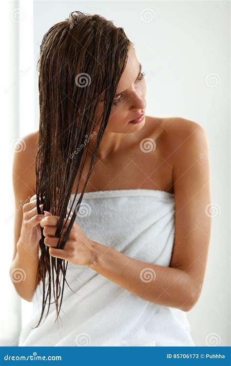 Hair Care Beautiful Woman With Wet Hair In Towel After Bath Stock