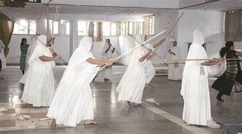With Sticks In Their Hands Woman Jain Monks In Surat Train Thrice A