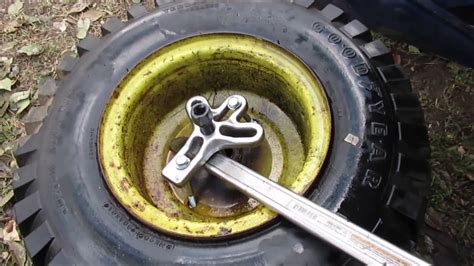 Remove Rusted Stuck Rear Wheel On Riding Mower Youtube