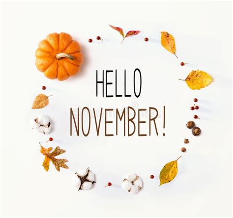 Hello November Message With Autumn Leaves And Orange Pumpkin Stock