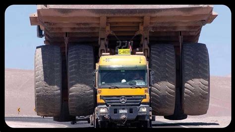 The Largest Dump Truck In The World Belaz 75710 In Work Lifting 450