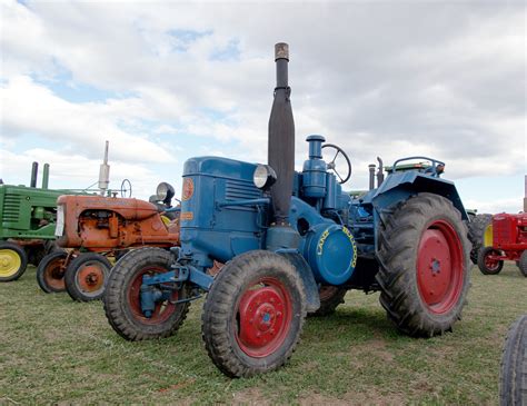 Free Images Tractor Field Farm Farming Agriculture Publicdomain