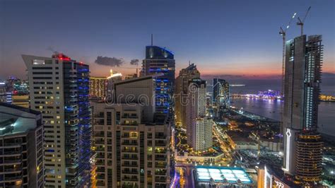 Jbr And Dubai Marina After Sunset Aerial Day To Night Timelapse Stock