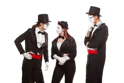 Portrait Of Three Mime Artists Performing Isolated On White Background