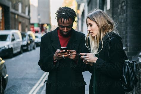 Attractive Man And Woman Swap Phone Numbers Del Colaborador De