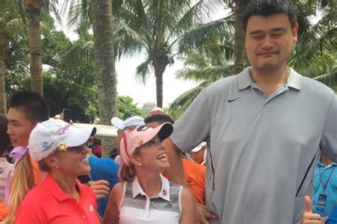 This has to be one of the craziest photos we'll ever see of gary player. NBA legend Yao Ming plays with Natalie Gulbis and Gary ...