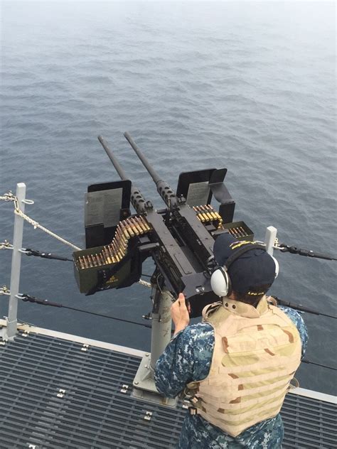 Dual Browning 50 Caliber Machine Guns On The Side Of The Uss Anchorage