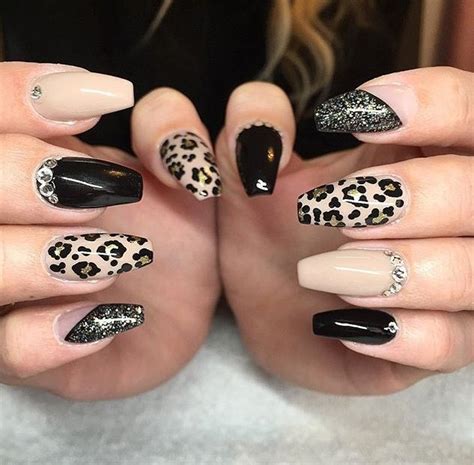 Animal print nails are a popular trend this summer. Need to get these nails some day. Maybe gel or acrylic ...