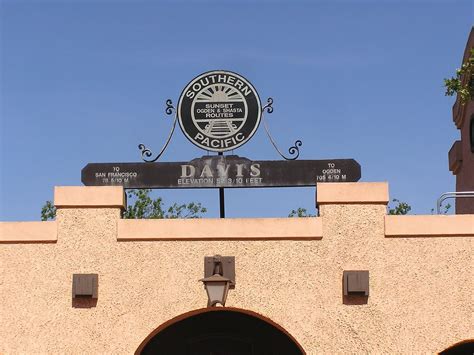 A Sign On Top Of A Building That Says Southern Pacific District Dairys
