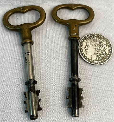 Lot Antique Pair Of Ornate Double Sided Skeleton Keys W Brass Handles