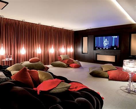 This living room boasts a theater area, an elegant black billiard pool with a beige cloth and a bar area lighted by a modish game room featuring a stunning billiard pool and very attractive wall decors. How to Design a Home Theater Room - Bonito Designs