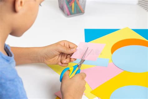 Kid Hands Cutting Colored Paper With Scissors Education Learning