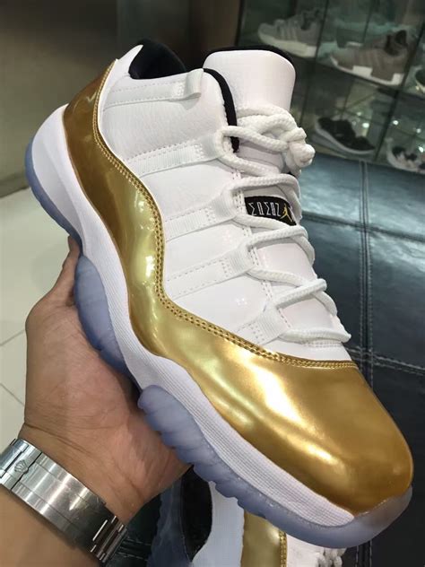 Have an air jordan xi retro? Air Jordan 11 Low White Gold Olympic - Sneaker Bar Detroit