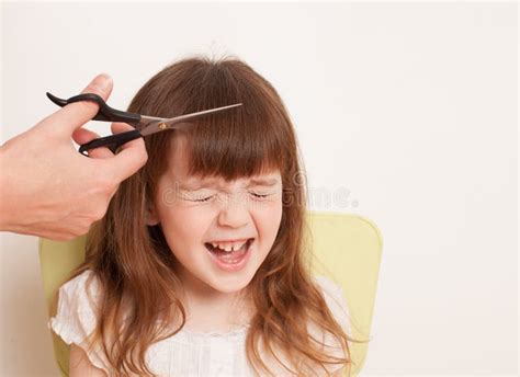 Mom Cuts Her Daughter S Wet Hair Cutting Hair At Home Stock Image