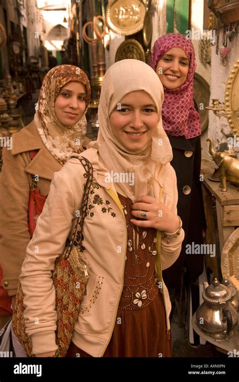 Three Young Libyan Women In The Copper Souq Of The Old Town Or Medina