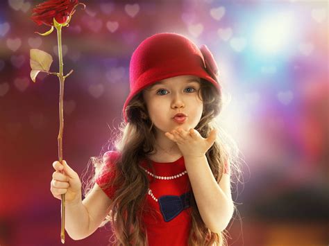 Download Baby Girl Holding A Rose Wallpaper