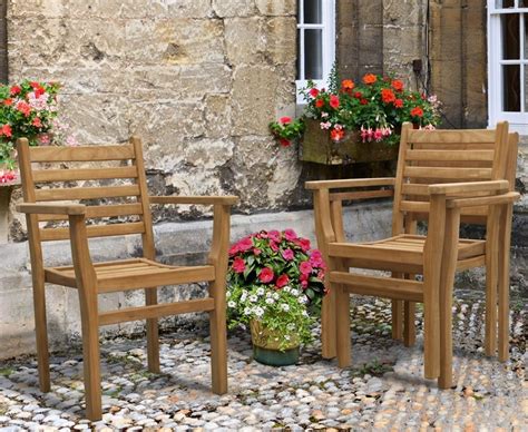Choose whatever suits your garden, patio or balcony the best, and get ready to. Yale Teak Outdoor Dining Set With 8 Stacking Chairs