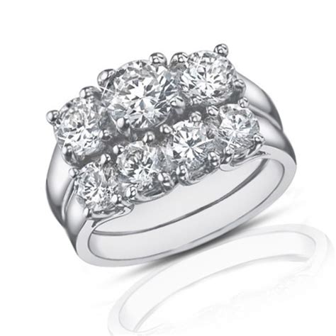Some of the flat band wedding ring designs are called pipe rings, for that purpose, and for that reason. 2.25 Ct Three Stone Round Diamond Engagement Ring With ...