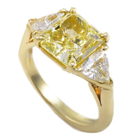 Hannah florman's designs are all courtesy of tiffany & co. Tiffany and Co. Yellow Diamond Yellow Gold Three-Stone ...