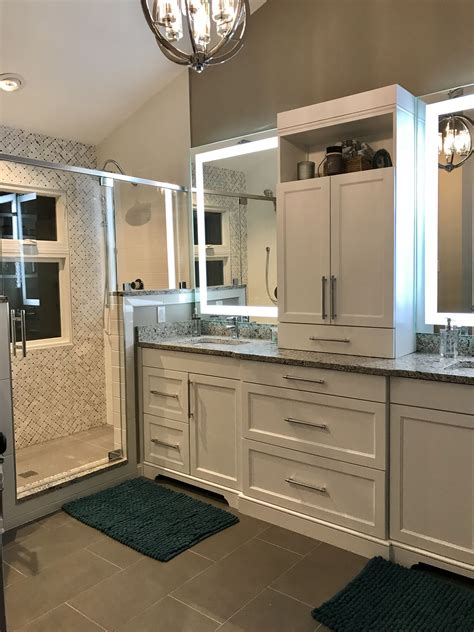 Check spelling or type a new query. Custom white double vanity in master with center tower ...