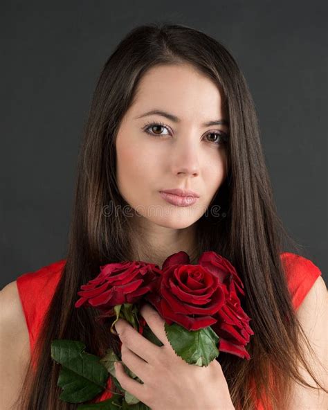 Brunette Woman With A Big Bouquet Of Red Roses Stock Image Image Of