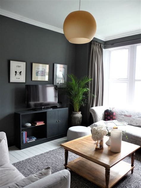By integrating sofas into hallways, wall alcoves, bookshelves and more. Decorating with dark colours, grey lounge. | Living room ...