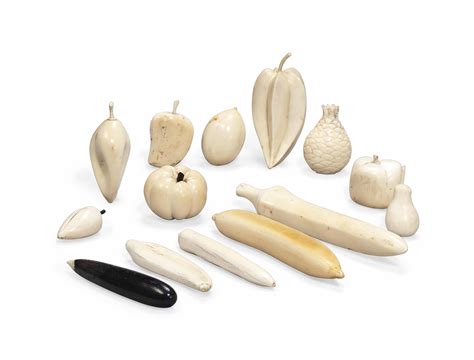 A Collection Of Fourteen African Carved Ivory Fruit Late 19th Century