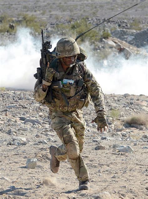 Delve deeper into what truly makes a marine, a marine. Royal Marine in the Mojave Desert During Exercise Black Al ...